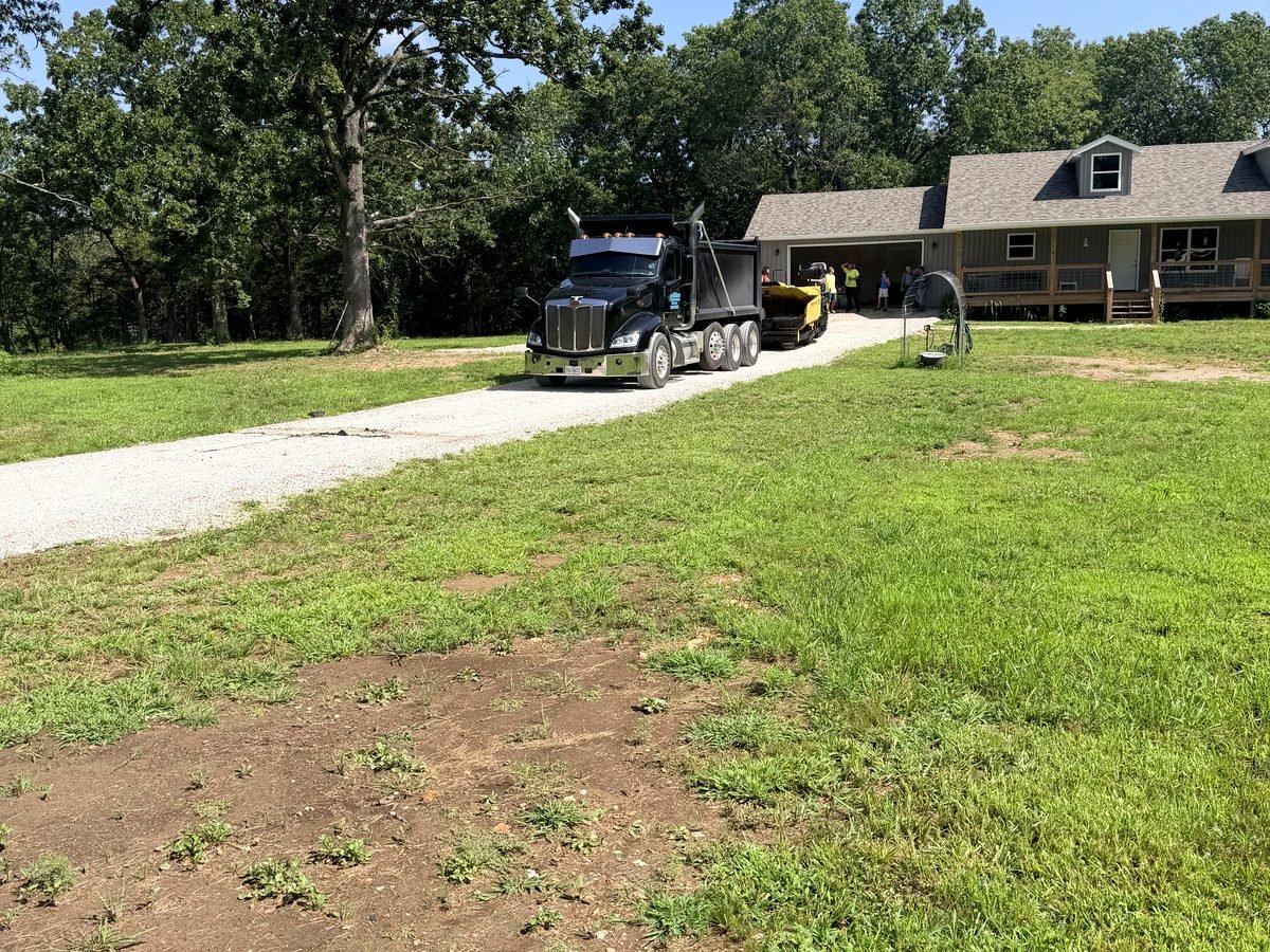 Base graded and compacted before paving on a private road build